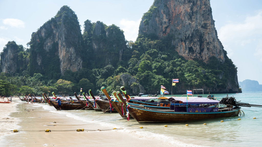 boat docking on the shore of Railay Beach, Thailand for Travel Diary Thailand