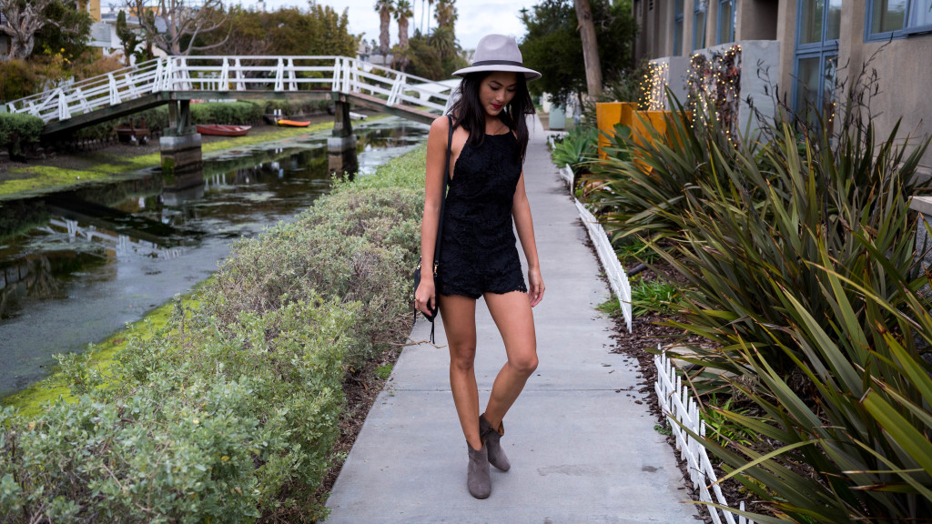 Woman wearing black romper in Venice