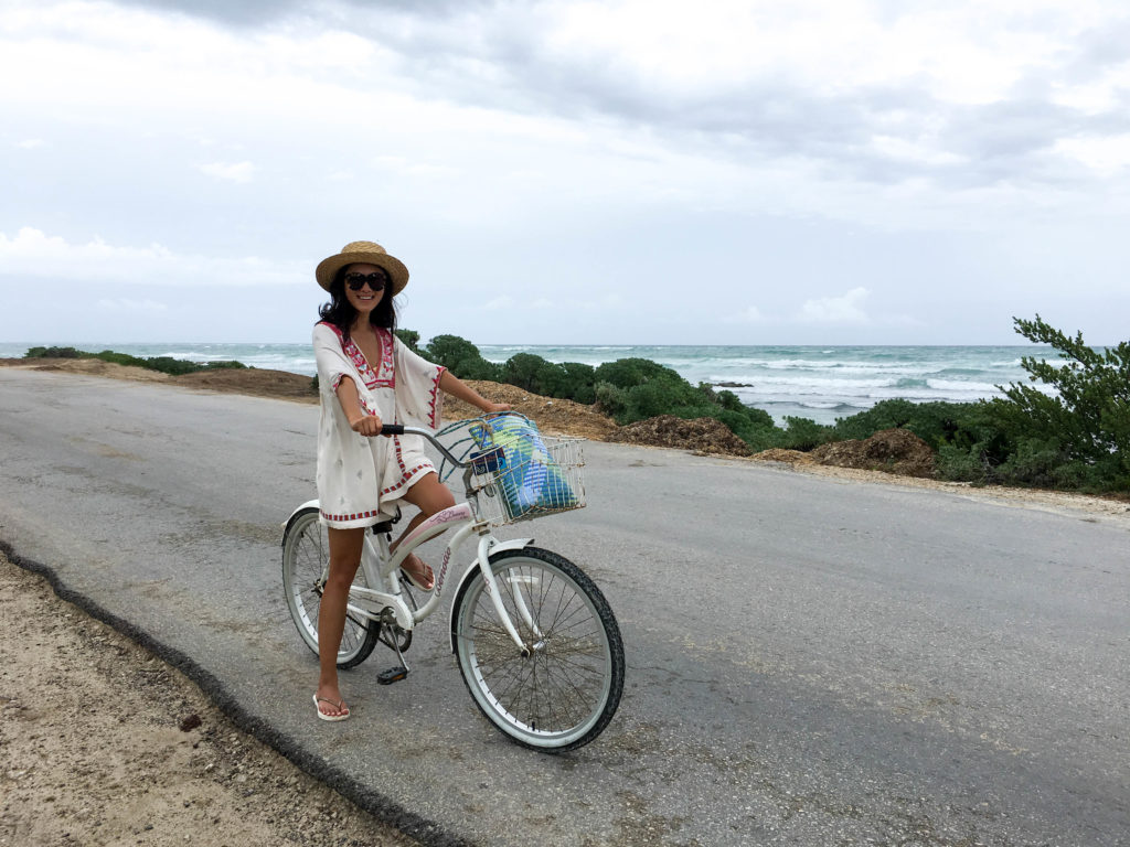 Amy Zhang The Luxi Look riding a biker for her Tulum Travel Diary