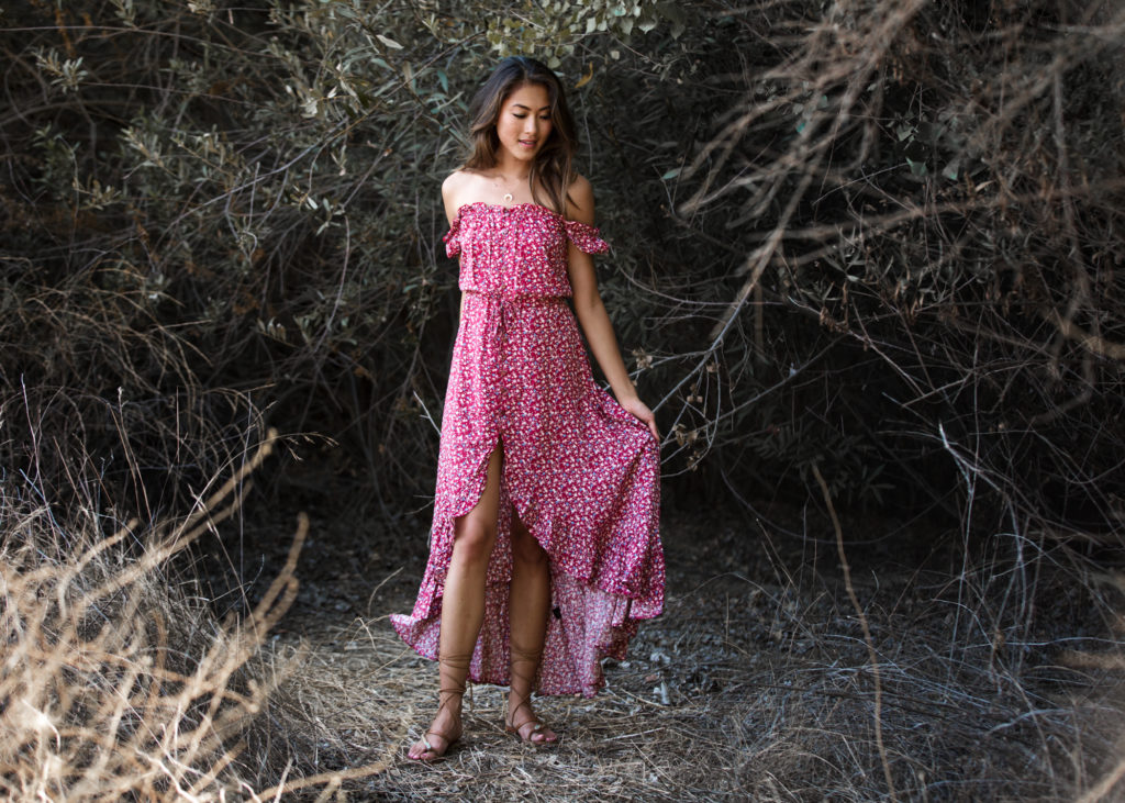 woman in the outdoors wearing Auguste the Label off shoulder maxi dress