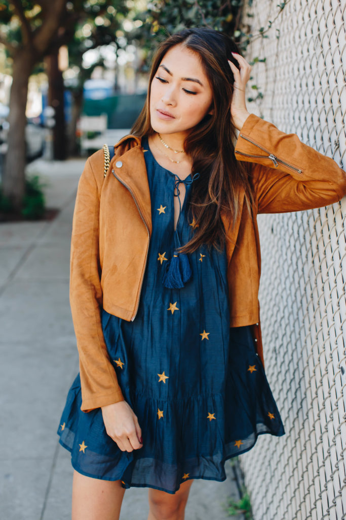 Blogger Tips: 5 Ways to Get Noticed by Brands | The Luxi Look wears a Tularosa star printed dress, Lovers + Friends Suede Jacket, Gucci GG Marmont bag