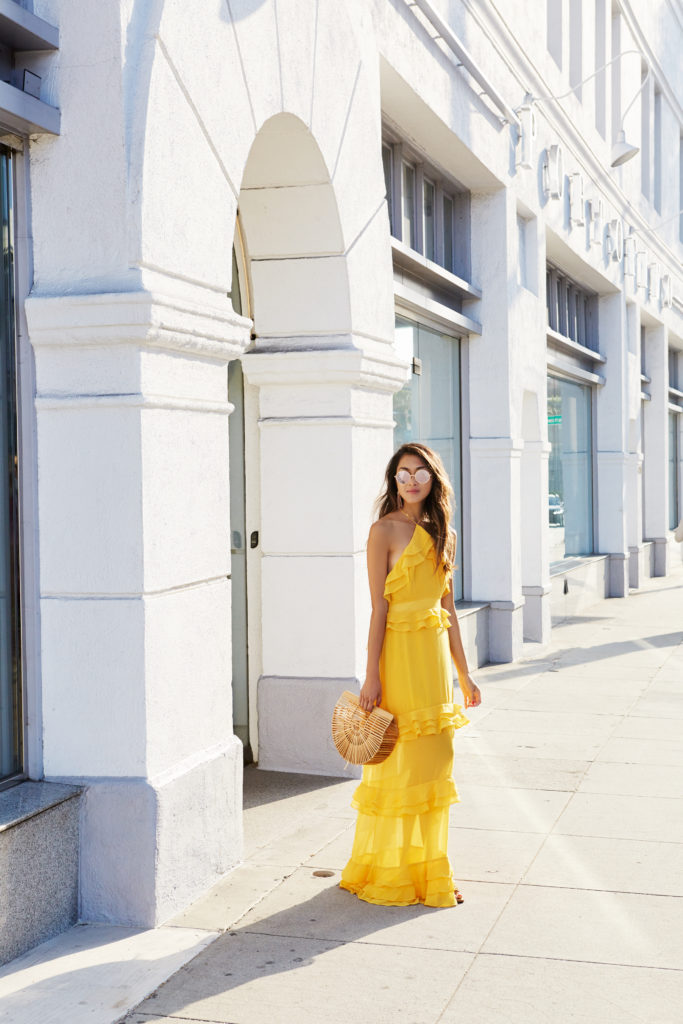  Amy is wearing a gorgeous yellow halter top ruffle dress by The Luxi Look