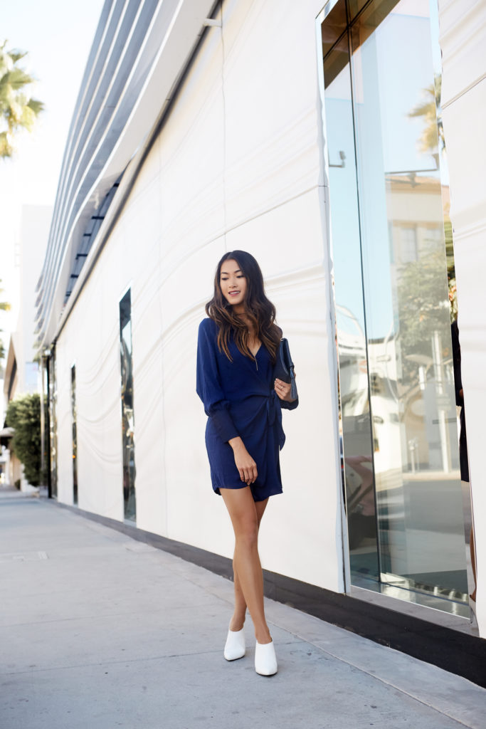 woman in blue dress and white shoes for look from day to night