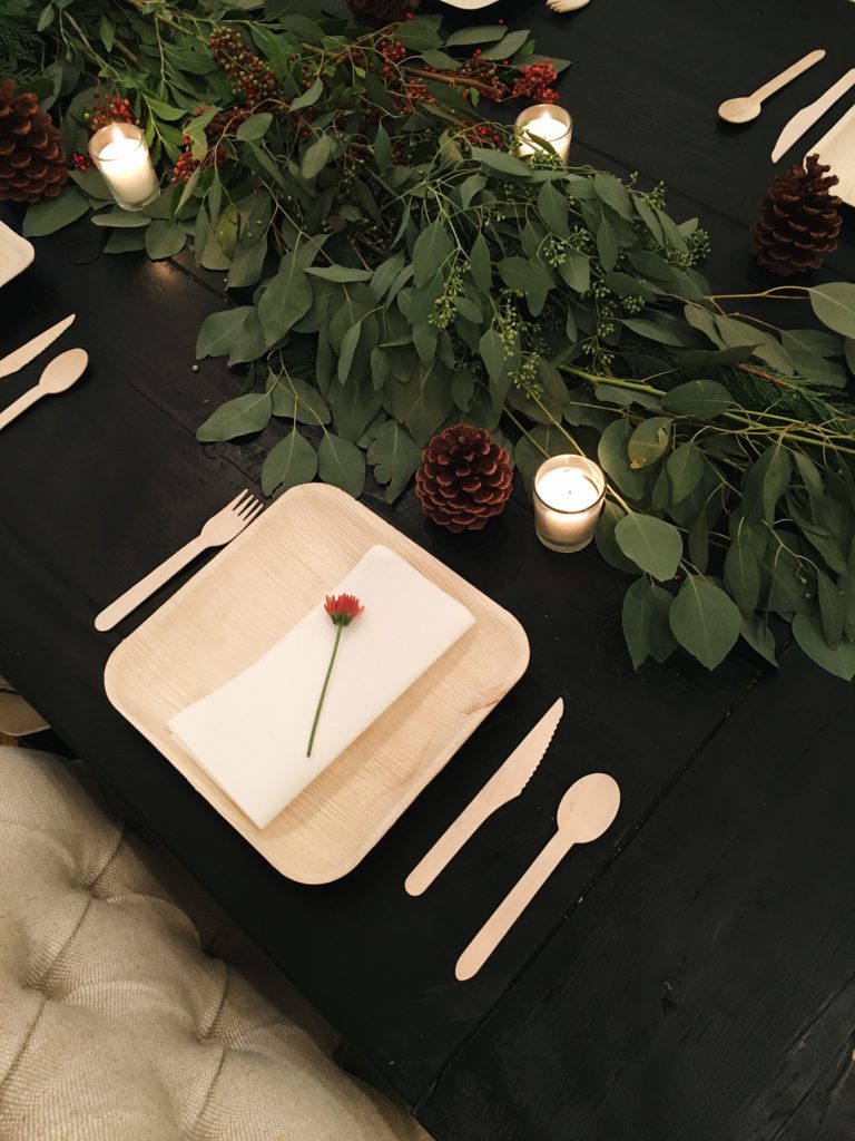 table setting with leaves and candles 