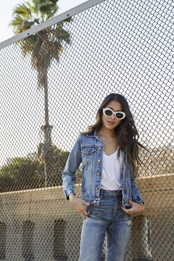 woman wearing jeans and jacket 