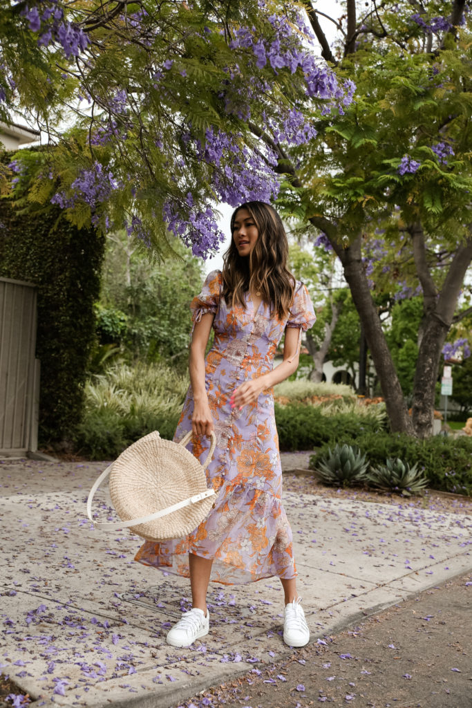 a cute dress and a bag on a girl