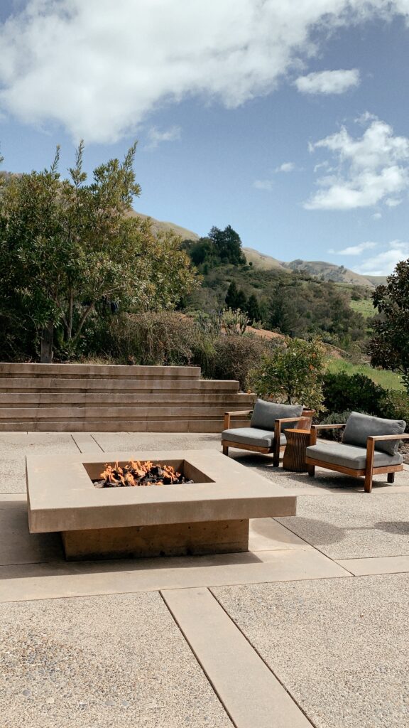 outdoor fire pit with two chairs