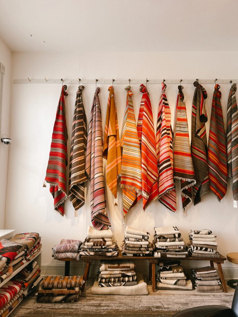 different scarves in a store in Santa Fe Roadtrip with Lexus